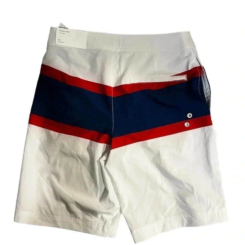 AE XS Board Shorts Brand new in white with blue and red accent colors